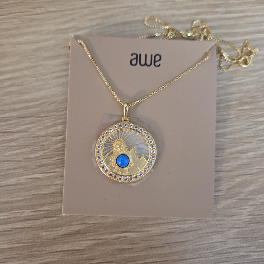 Awe Inspired Gold Necklace with Mother Earth Pendant